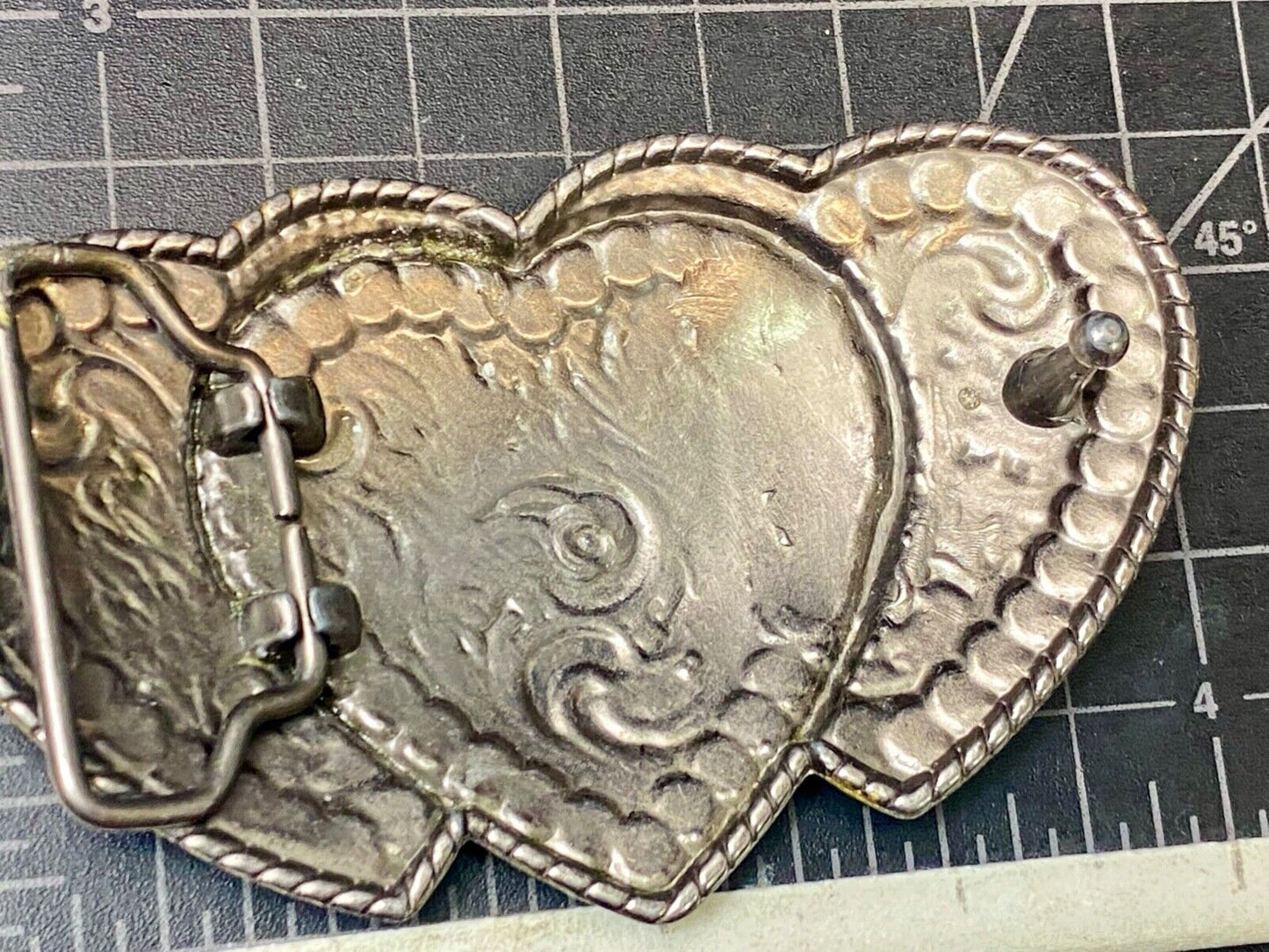 Three hearts ornate flower swirl belt buckle with thick rhinestone boarder