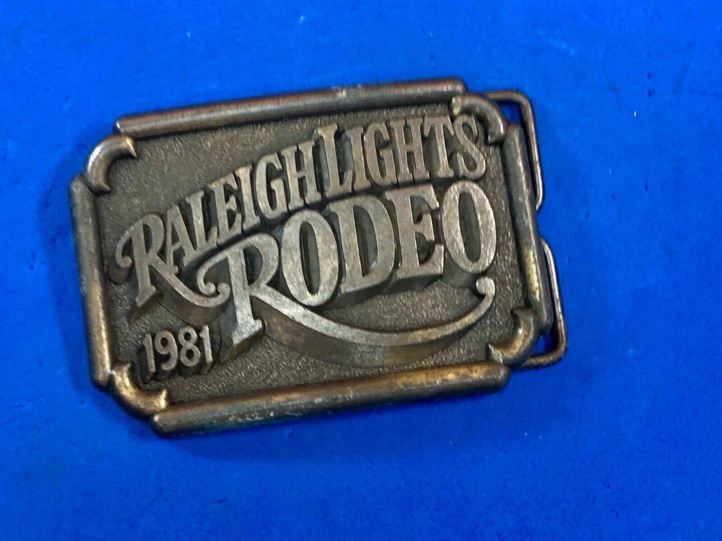 BELT BUCKLE, " RALEIGH LIGHTS RODEO Cigarette company sponsored event