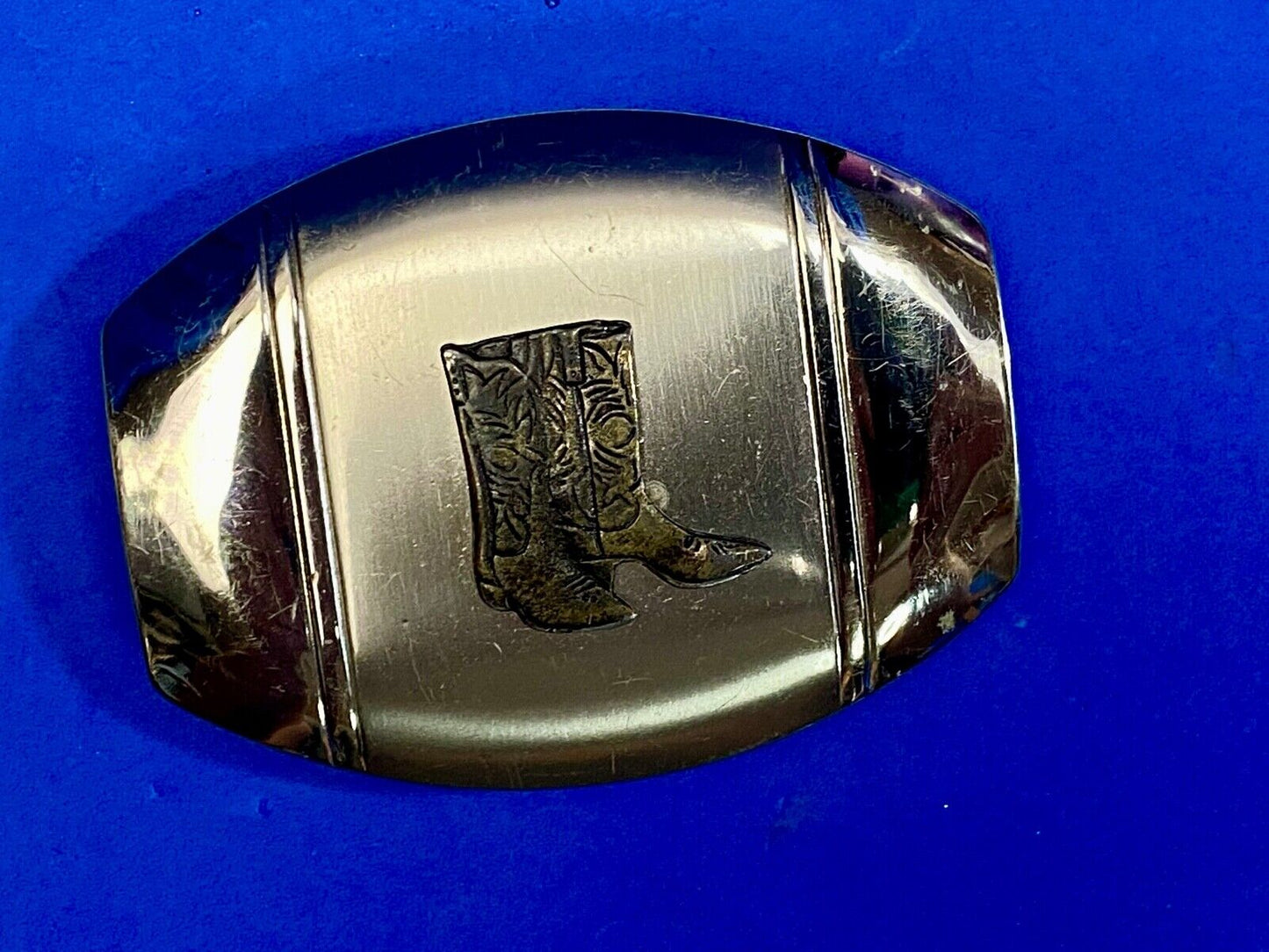 Vintage Cowboy Boots Centered On Western Oval Belt Buckle