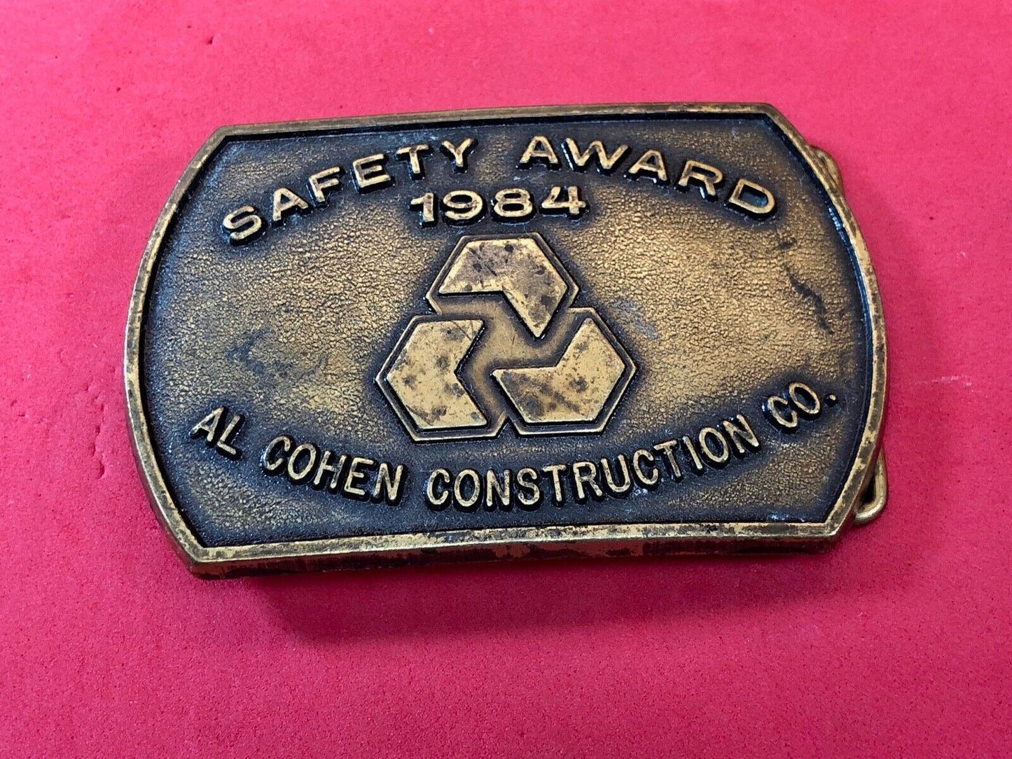 Vintage 1984 AL Cohen Construction Company promotional belt buckle safety award