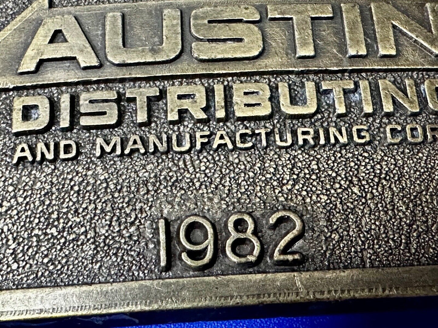 Austin Texas Distributing and Manufacturing 1982 Advertisement Promo Belt Buckle