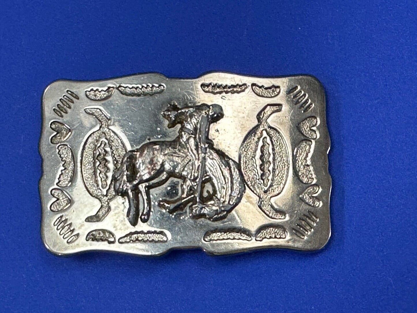 Vintage Cowboy Tipping Hat Head down Saddle Bronc western belt buckle