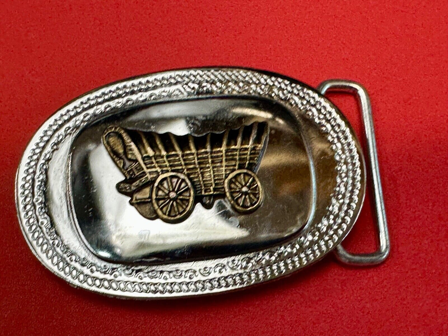 Vintage Covered Wagon on reflective oval two tone western belt buckle