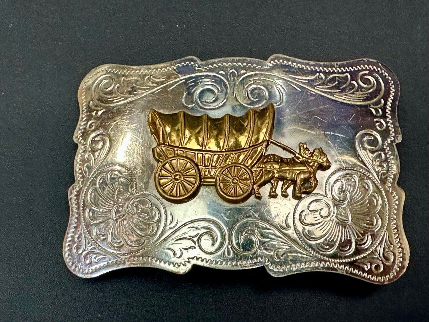 Vintage Covered Wagon two tone ornate cowboys out west flower swirl belt buckle