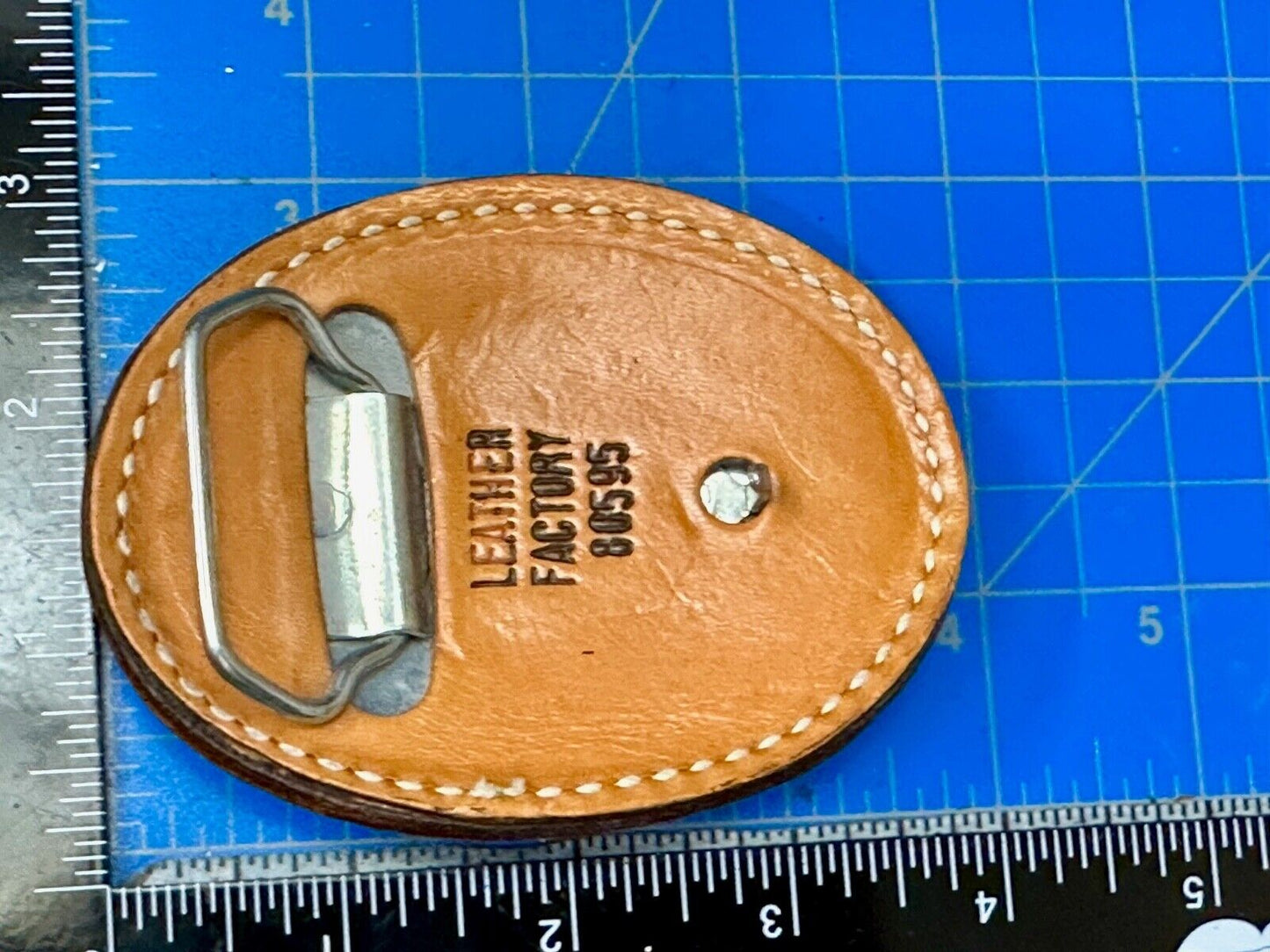 Beautiful Leather Factors Western oval mixed color / tooled Belt Buckle