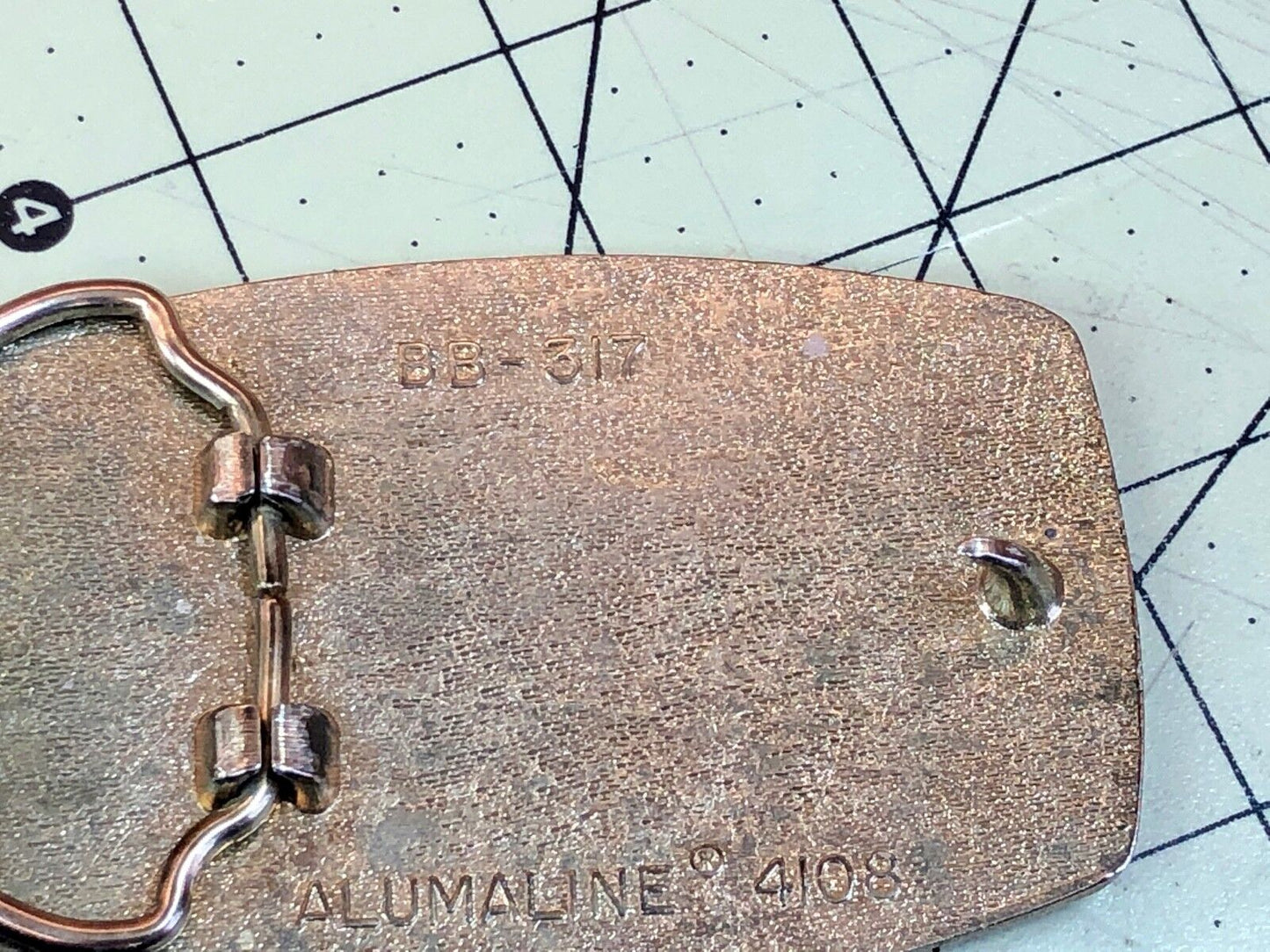 us telecom Telecommunications Industry Promotional belt buckle by Alumaune