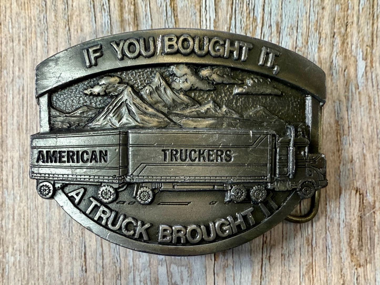 American Truckers IF YOU BOUGHT IT A TRUCK BROUGHT IT Commemorative Belt Buckle