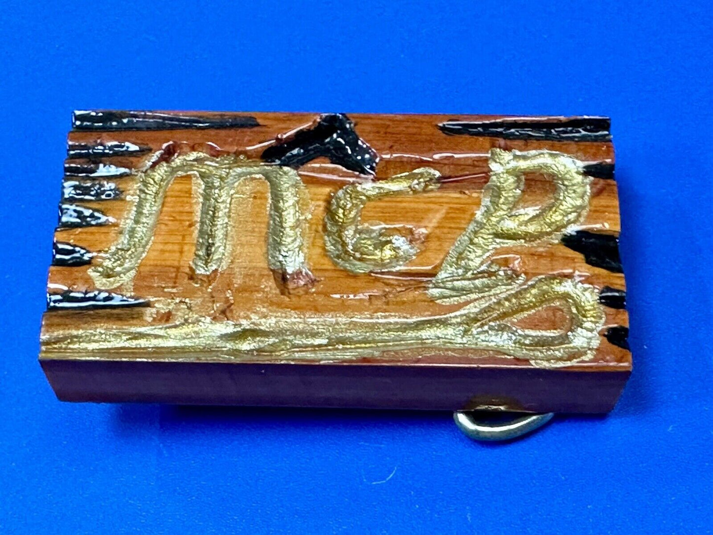 Artisan wood belt buckle with M & P engraved Initials