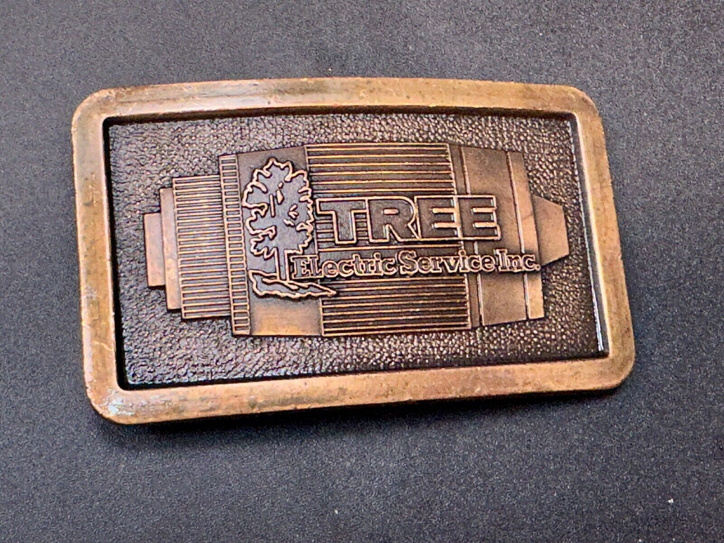 Tree electric service INC Vintage advertising promo brass tone Belt Buckle