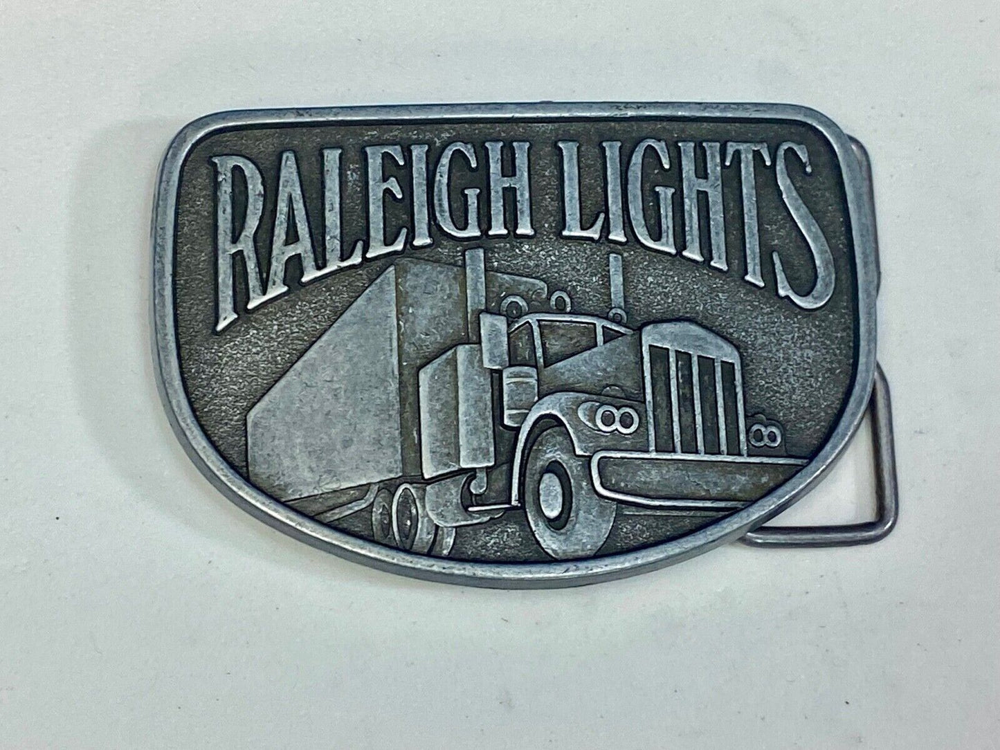 Vintage Belt Buckle Raleigh Lights Cigarette Trucker Trucking Cigarettes
