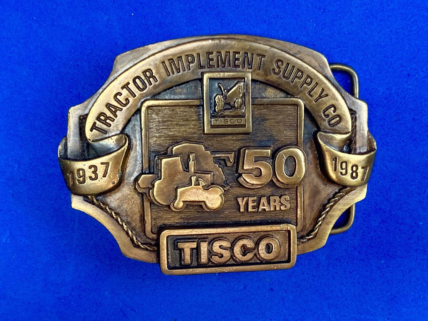 Vintage 1986 Tisco Tractor 50 years Anniversary Belt Buckle by Siskiyou