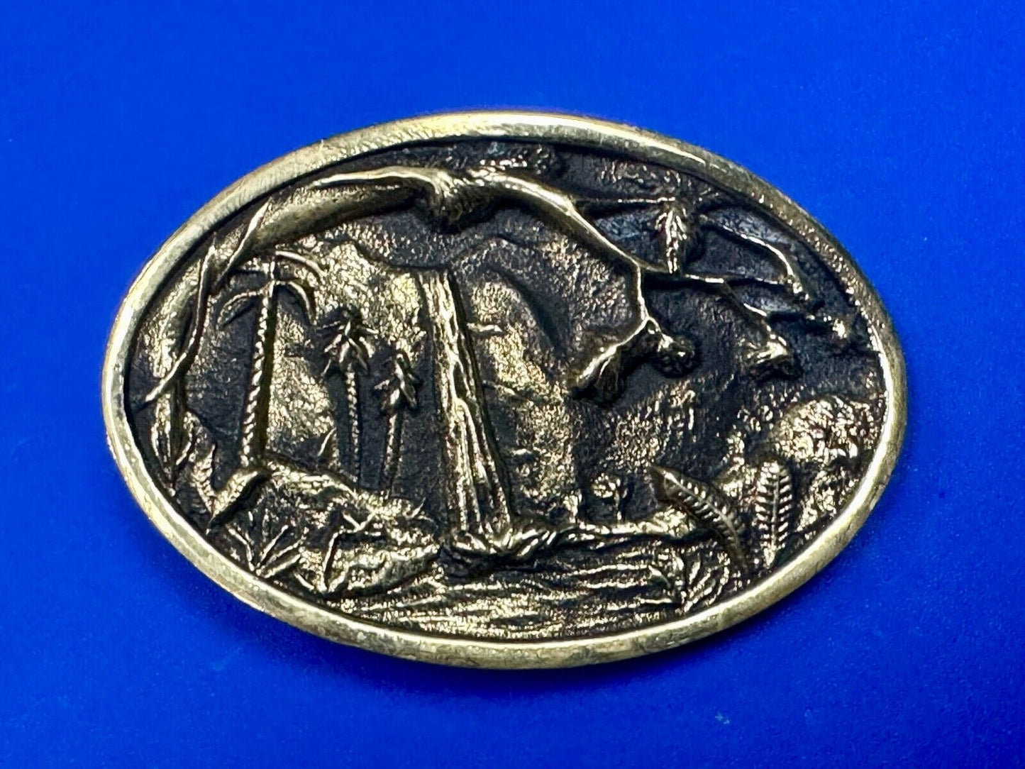 Beautiful water fall nature scene on Vintage BTS solid brass belt buckle