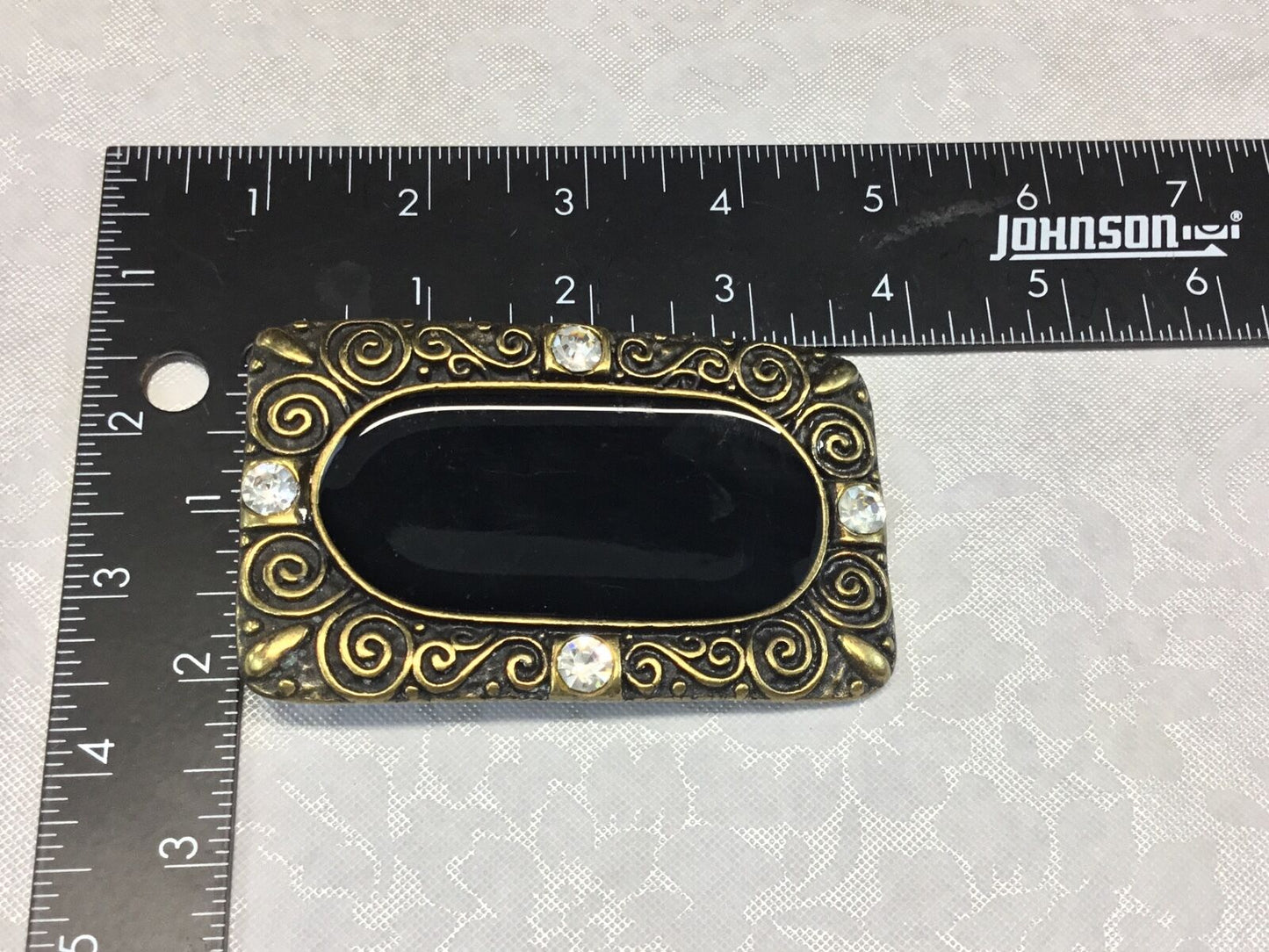 3.5". Designer / western / dress / Black and brass tone rhinestone belt buckle