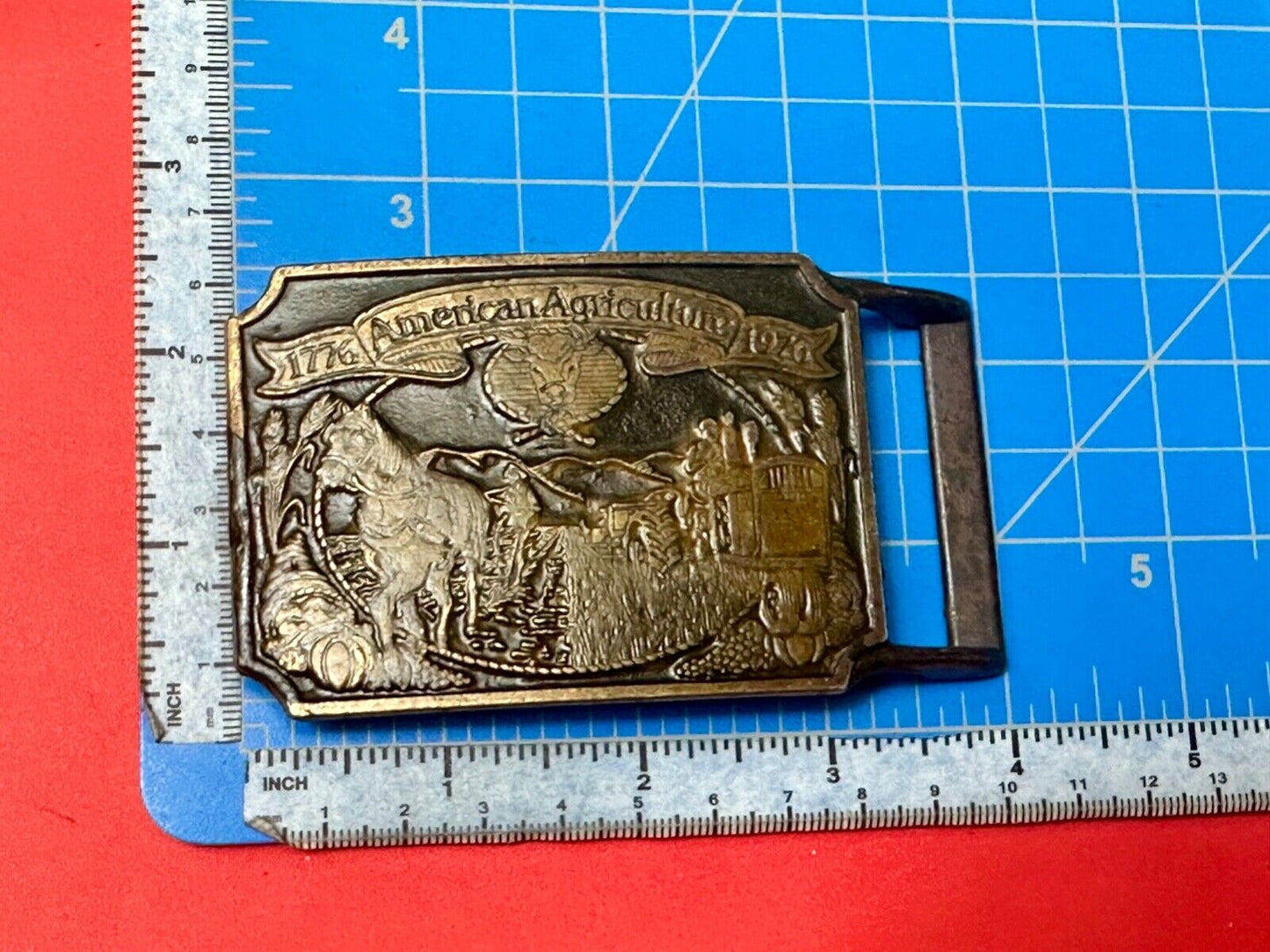 Bicentennial American Agriculture Horse to tractor, Vtg belt buckle by Ortho
