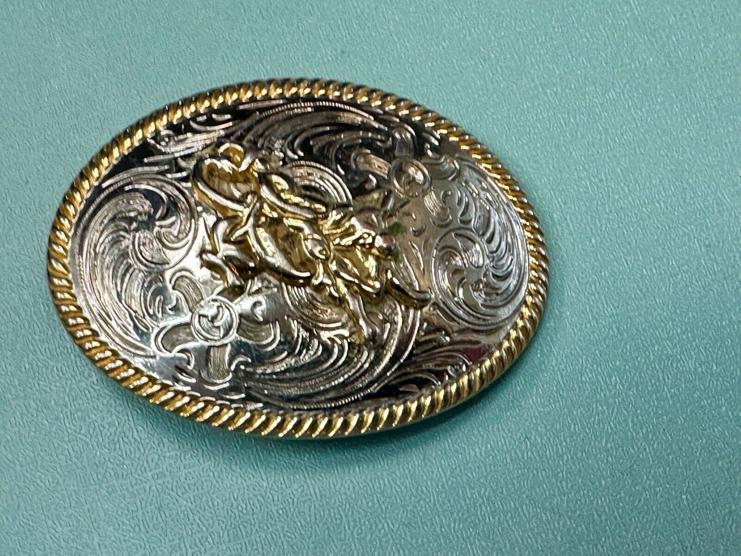 2.5" wide Two tone Vintage western rodeo cowboy belt buckle.