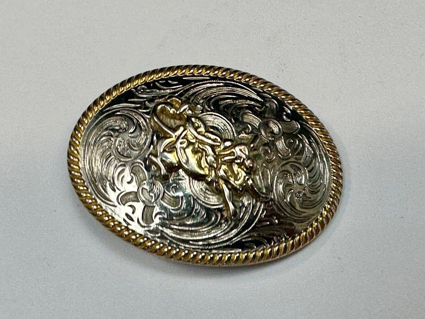 2.5" wide Two tone Vintage western rodeo cowboy belt buckle.