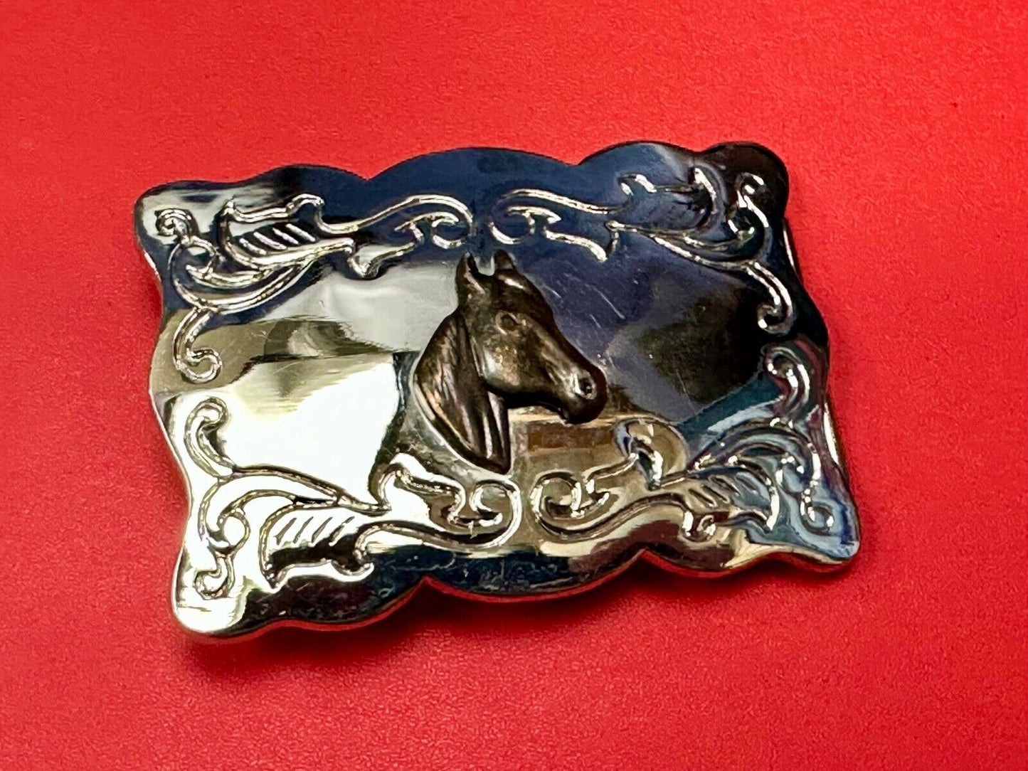Vintage horse head centered on western rectangular two tone belt buckle