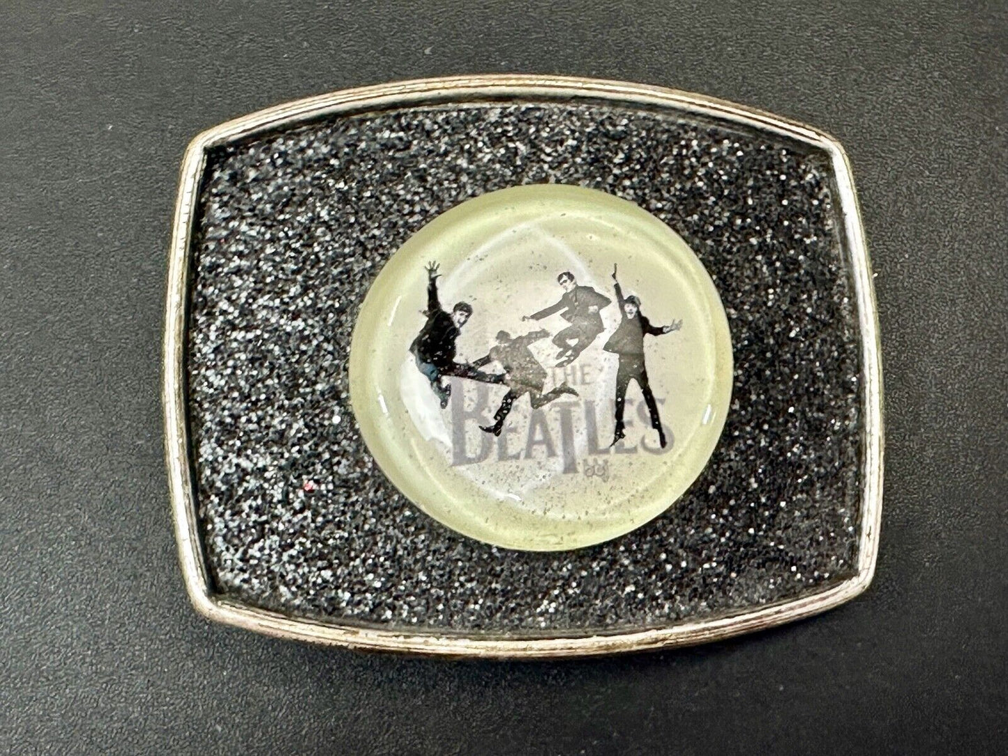 The Beatles - Black White Round Centerpiece belt buckle by Century Canada
