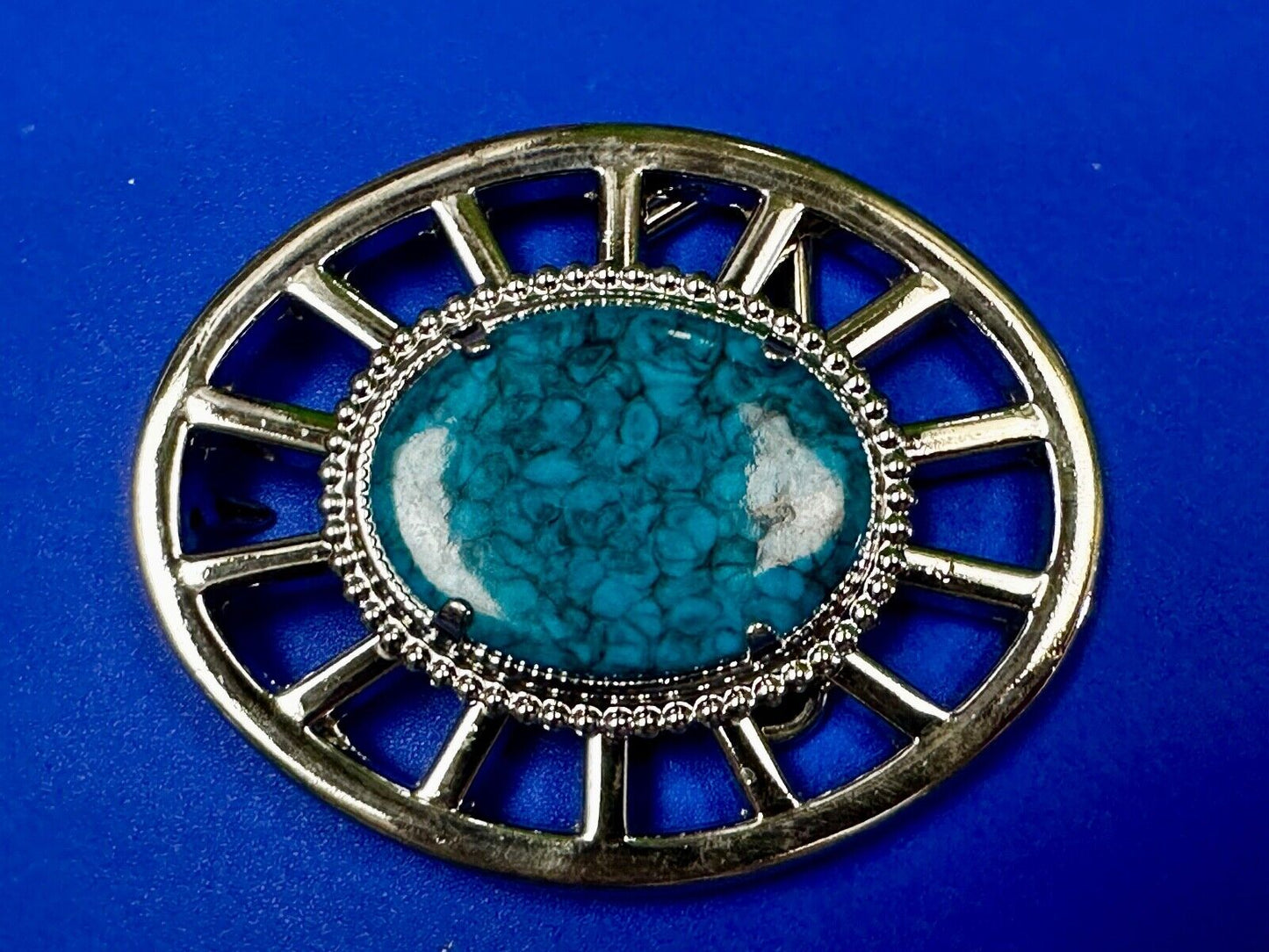 Synthetic Turquoise in unique see through silver tone round Belt Buckle
