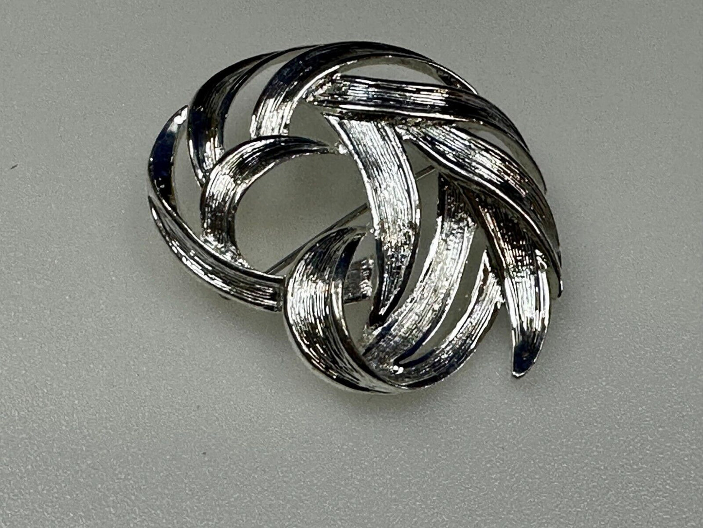 Swirled Curled Silver Tone Vintage Brooch Pin Signed Monet