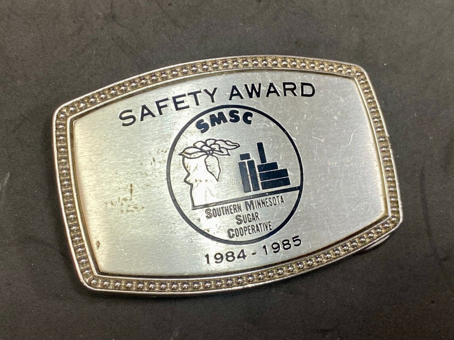 1985 - Smsc Southern Mn Sugar Cooperative Safety Award Belt Buckle By Alumaline