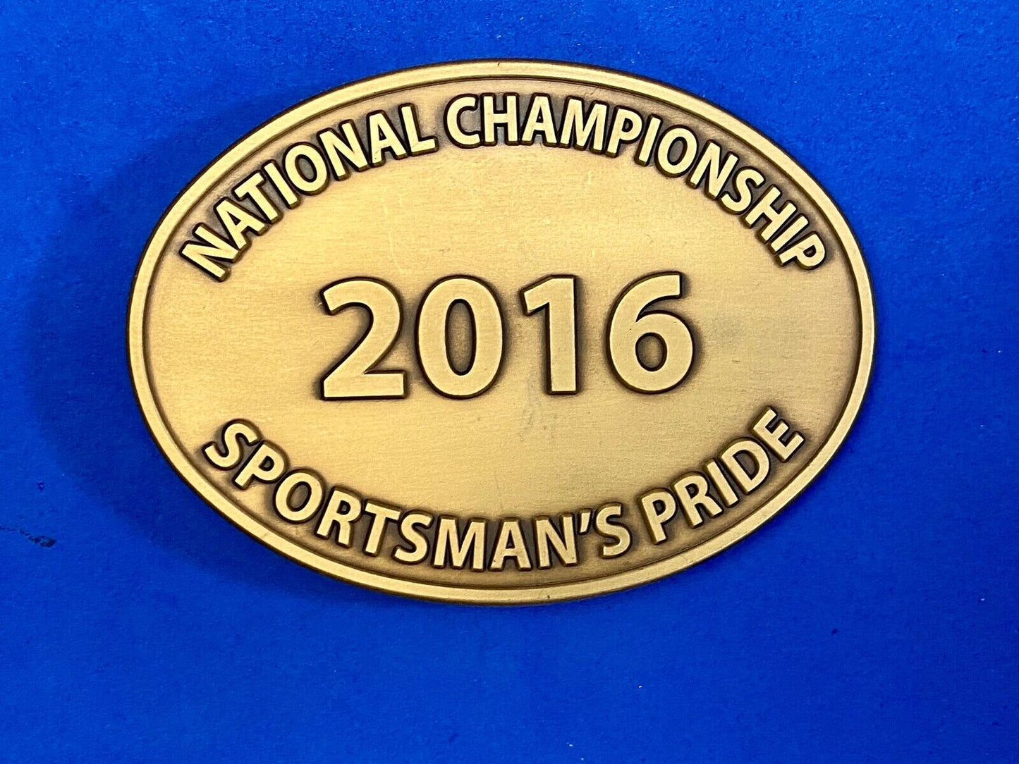 2016 National Championship Sportsman's Pride Gold Tone Oval Belt Buckle