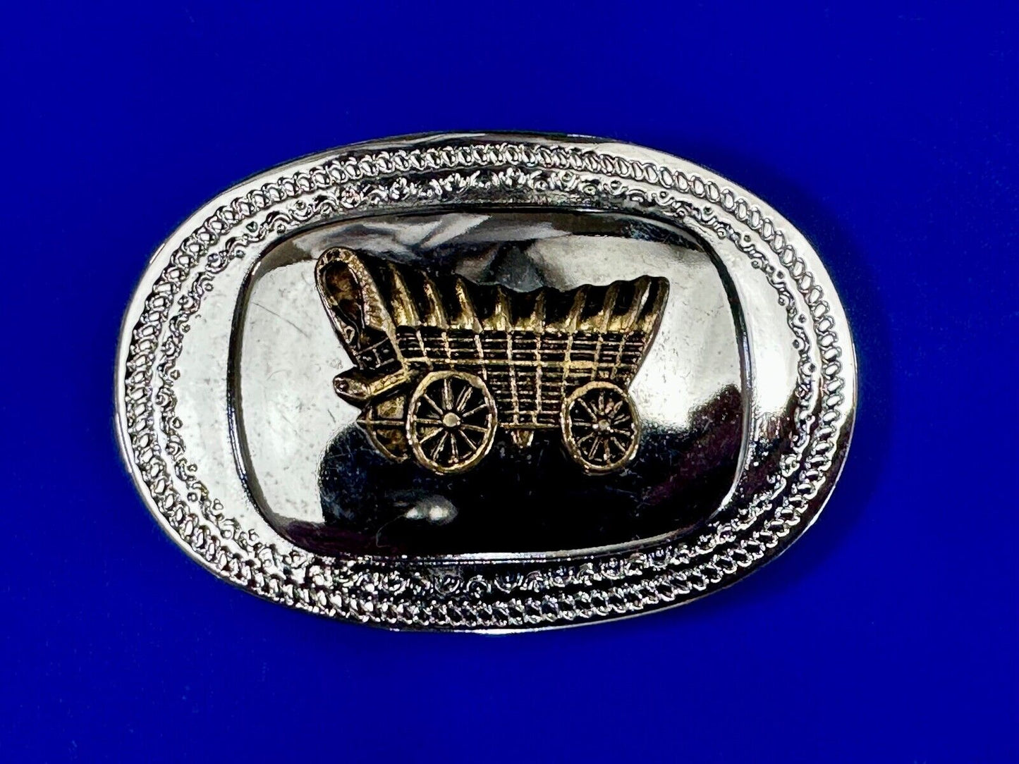 Vintage Covered Wagon - western two tone outlined belt buckle