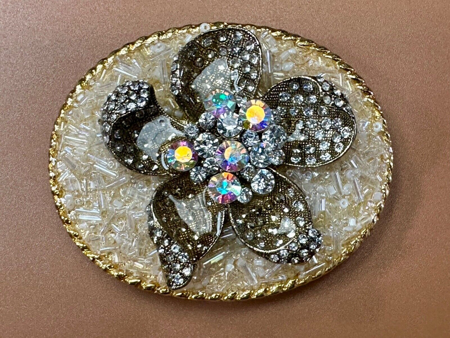 Beautiful chunky goldtone flower centerpiece in rhinestone accented belt buckle