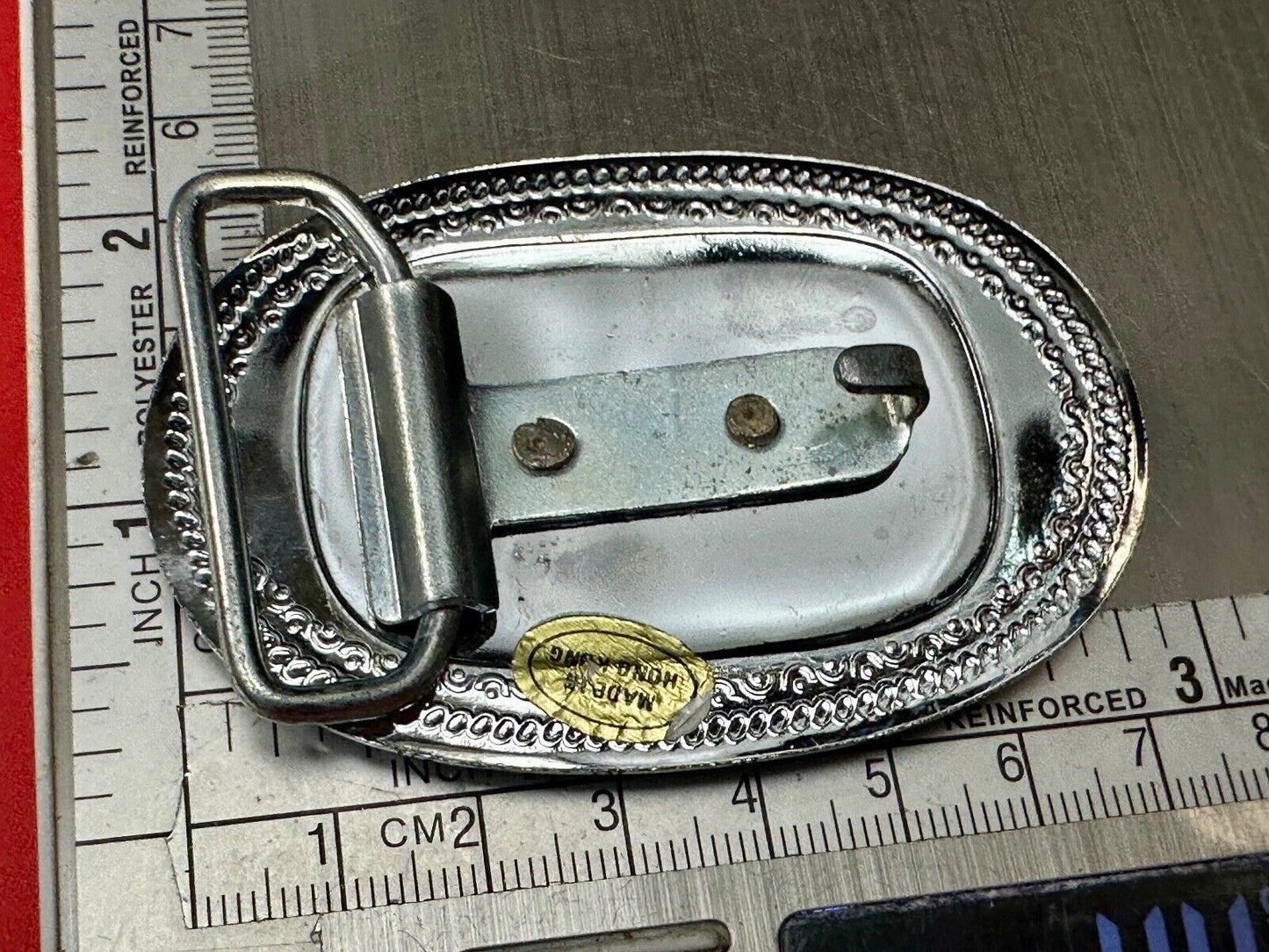 Vintage Covered Wagon on reflective oval two tone western belt buckle