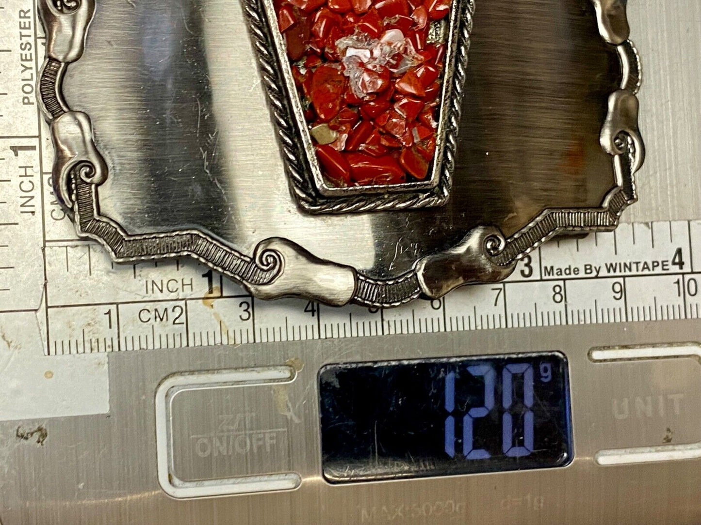 Vintage chunky red stones in centerpiece of Western Thick framed belt buckle