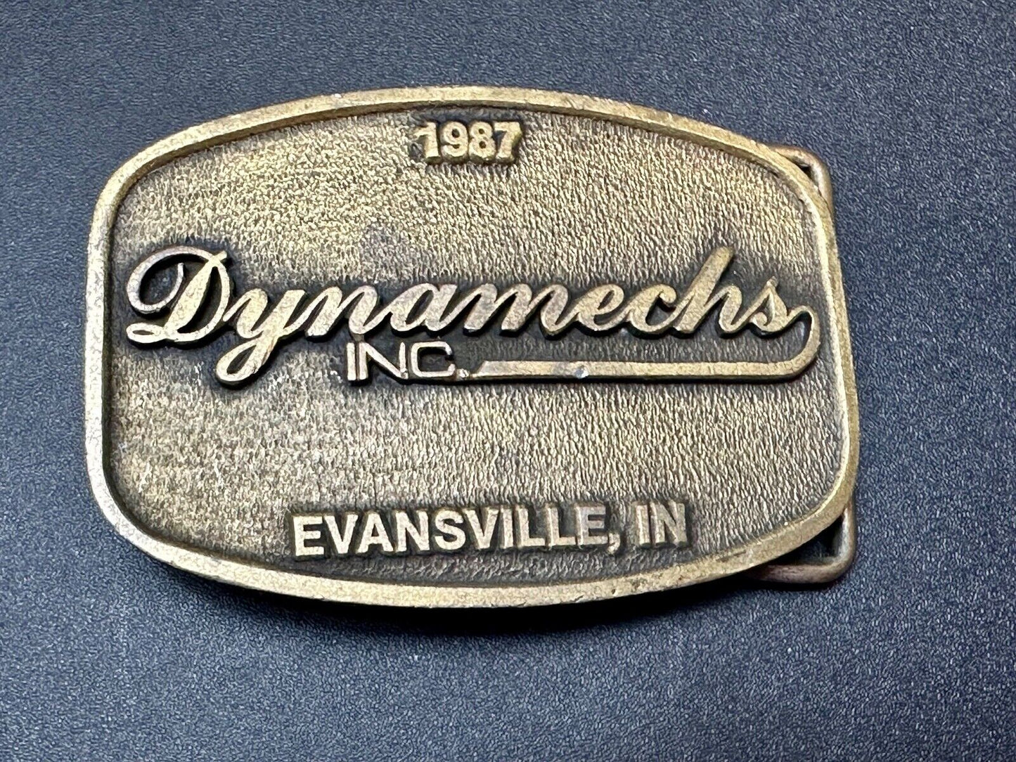 Vintage 1987 Dynamechs INC Evansville IN Truck Service belt buckle by CD Hit