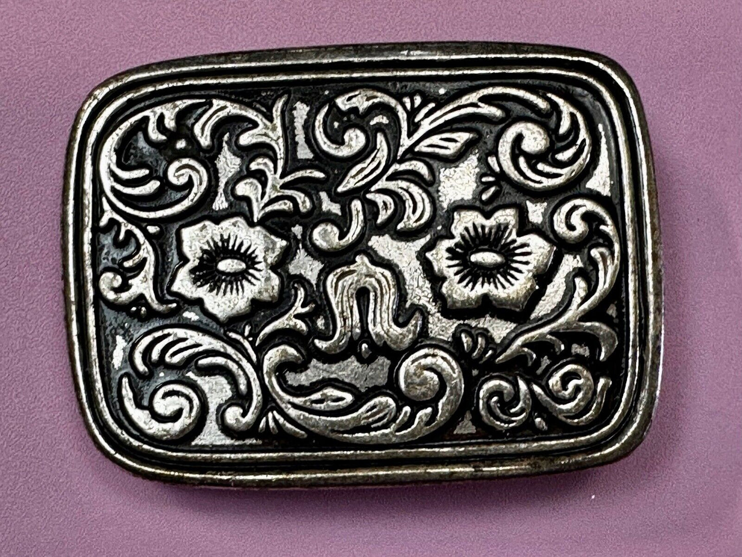 Vintage black and silver tone western flower floral theme cowboys belt buckle