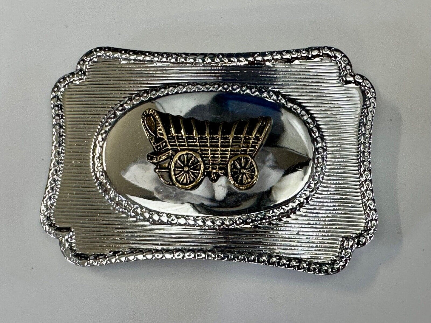 Vintage Covered Wagon - western two tone outlined belt buckle