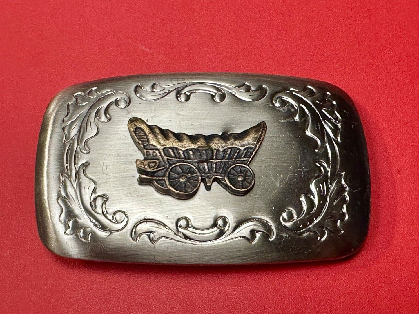 Vintage covered wagon two tone western mixed metal belt buckle