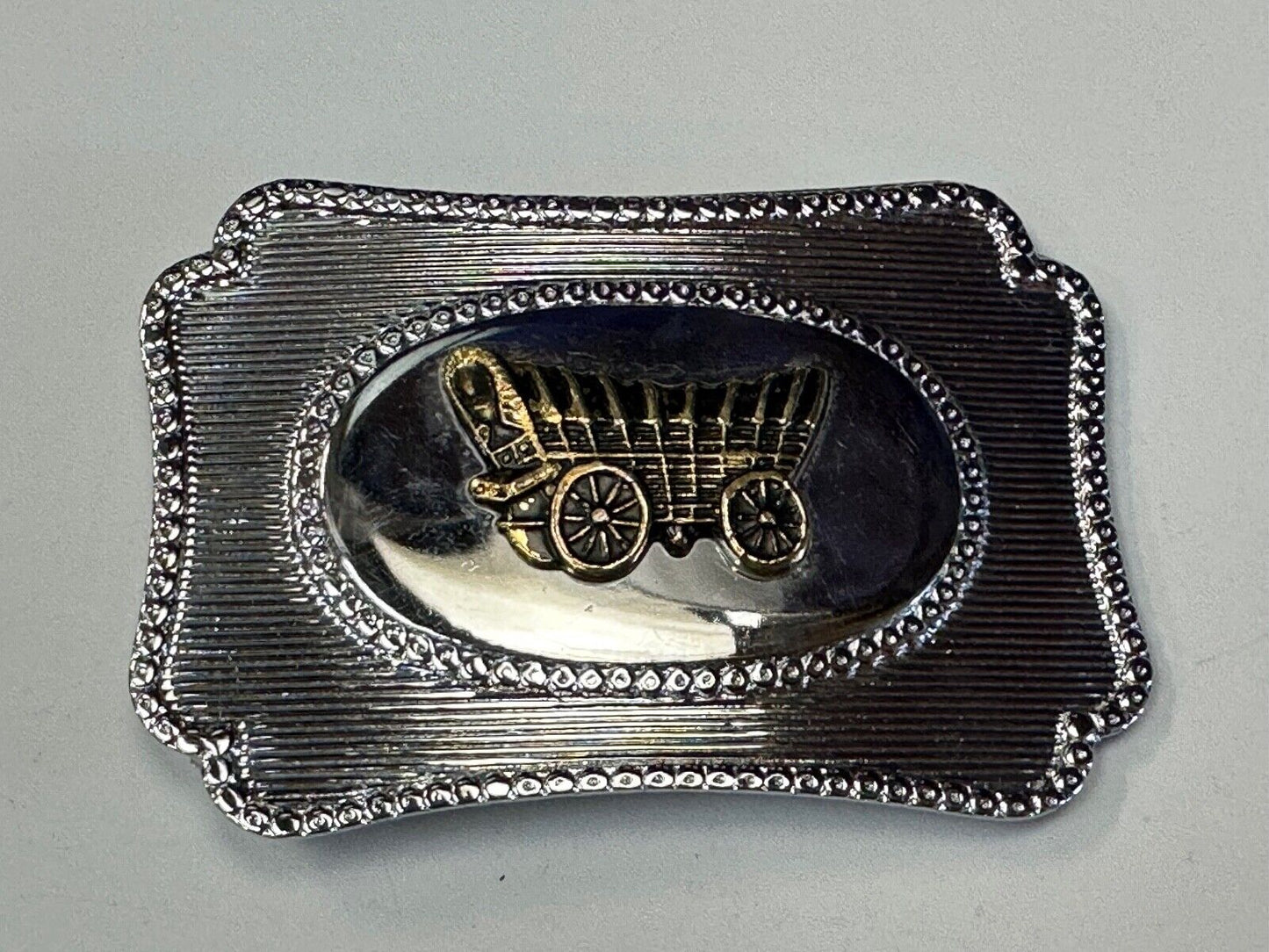 Vintage Horse Drawn Covered wagon on western two tone belt buckle