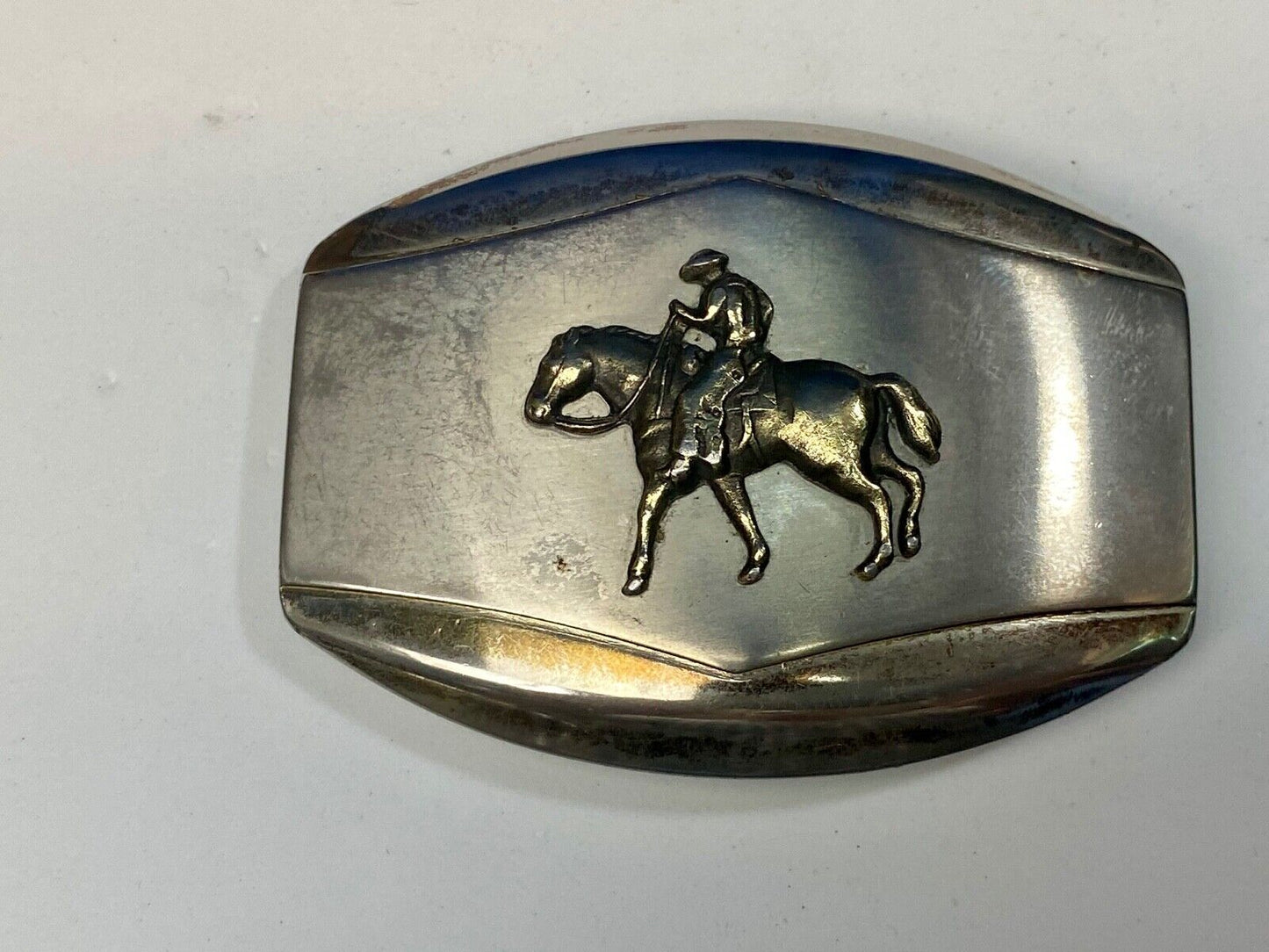 Vintage belt buckle Horseback old west cowboy riding the trail