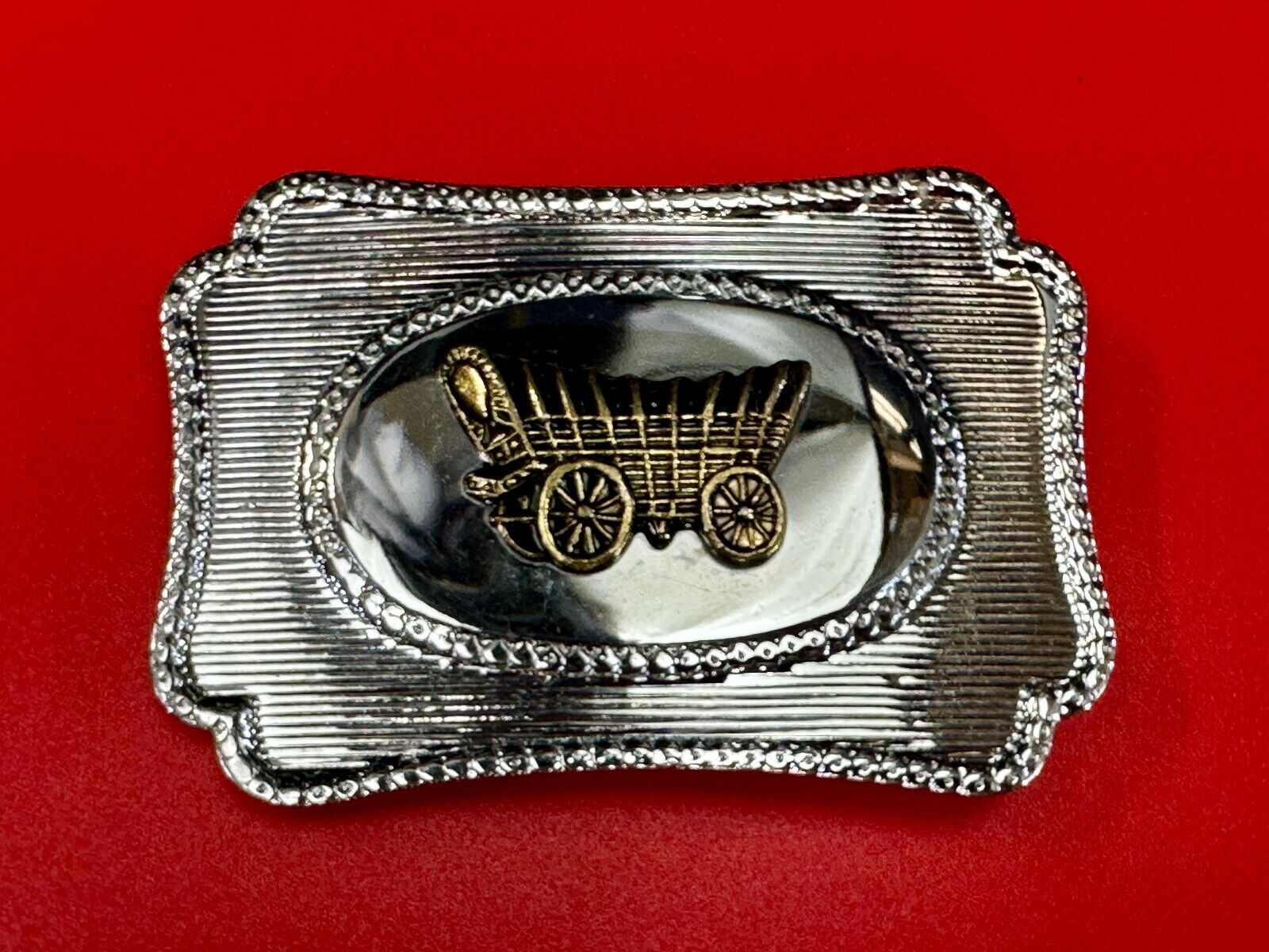 Vintage Covered Wagon - western two tone outlined belt buckle