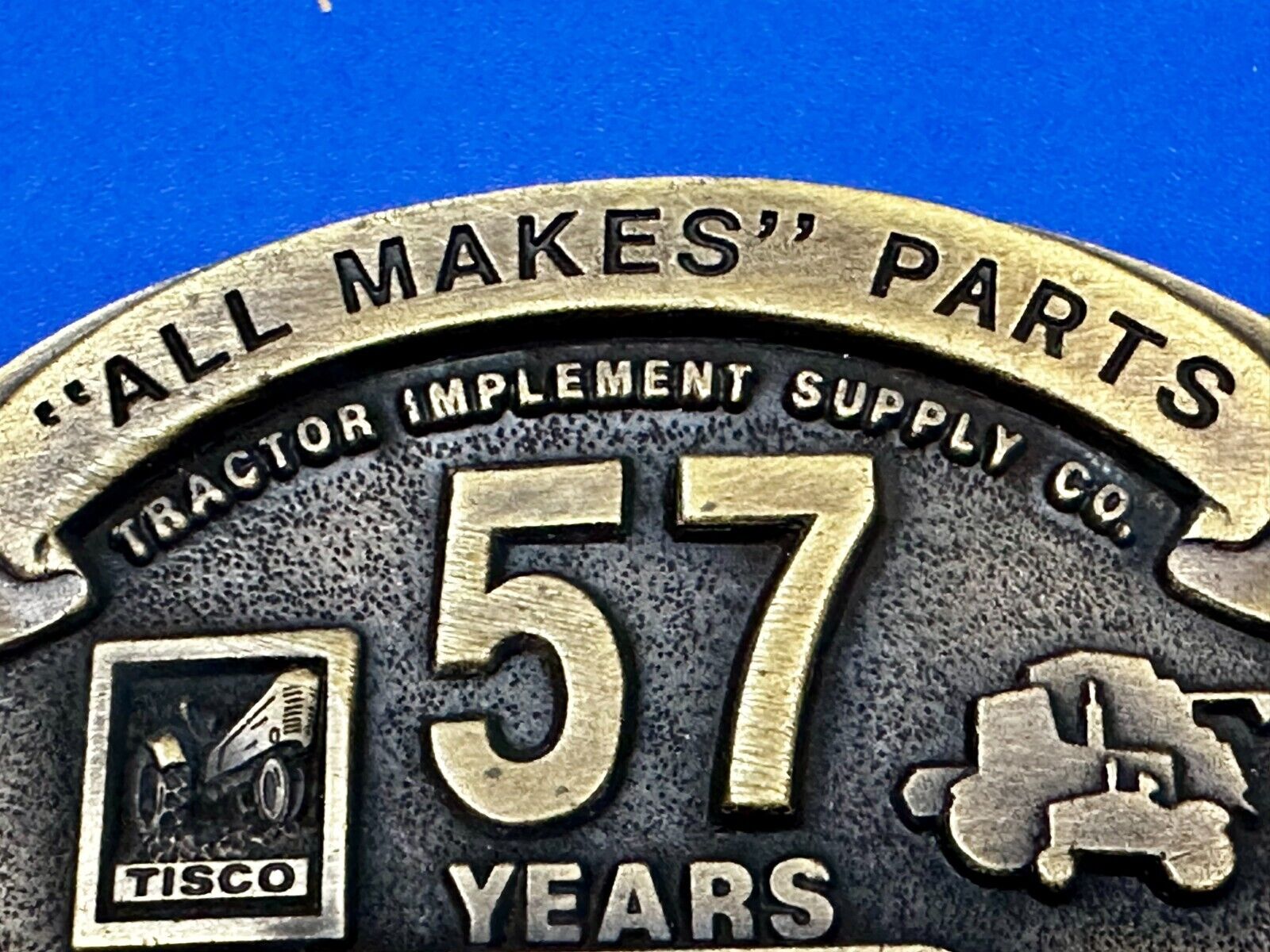 57 Years TISCO Tractor Implement Supply company NOS Belt Buckle by Speccast