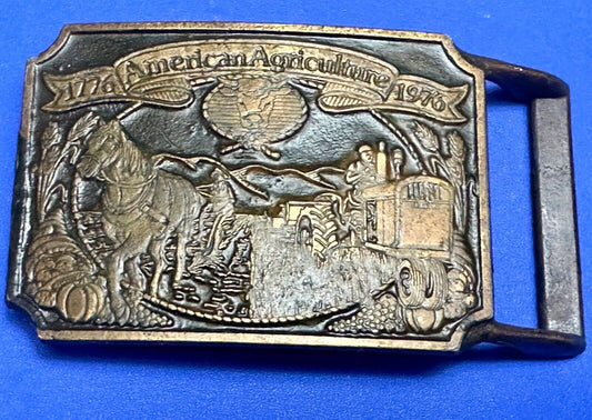 Bicentennial American Agriculture Horse to tractor,  Vtg  belt buckle by Ortho