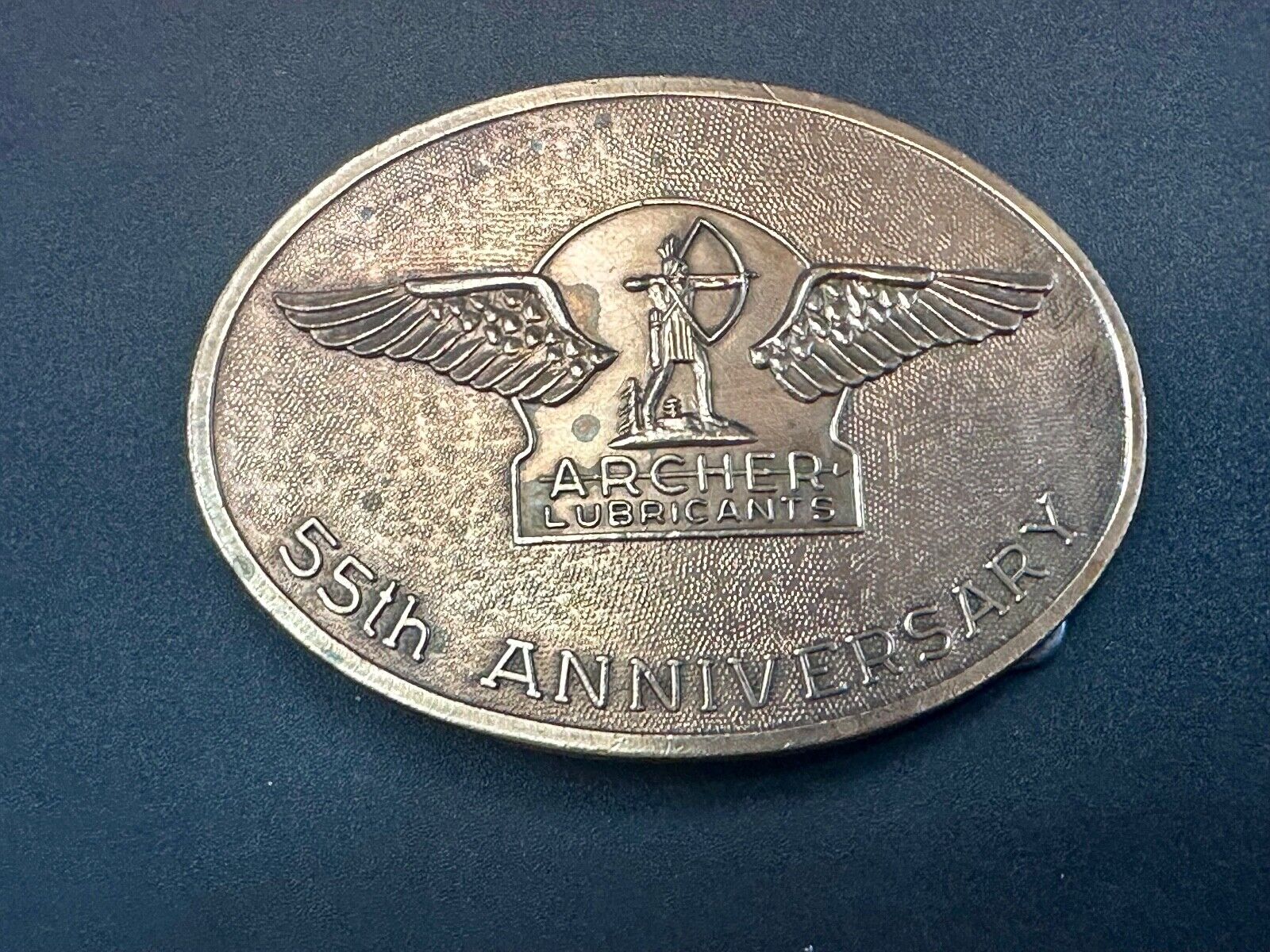 Archer Lubricants Omaha NE - Oil for farmers ranchers belt buckle
