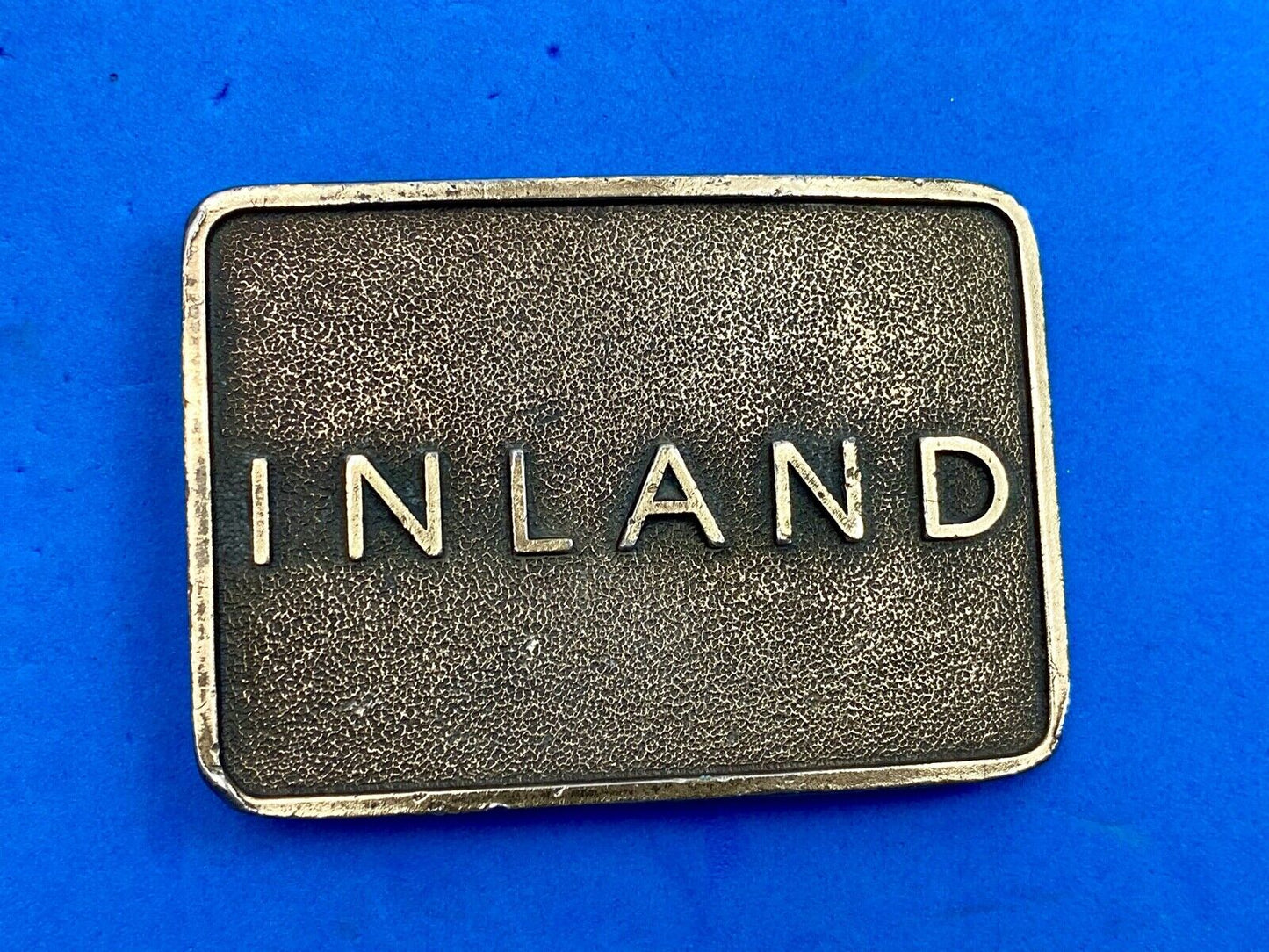 Vintage Inland company belt buckle - truck parts company 