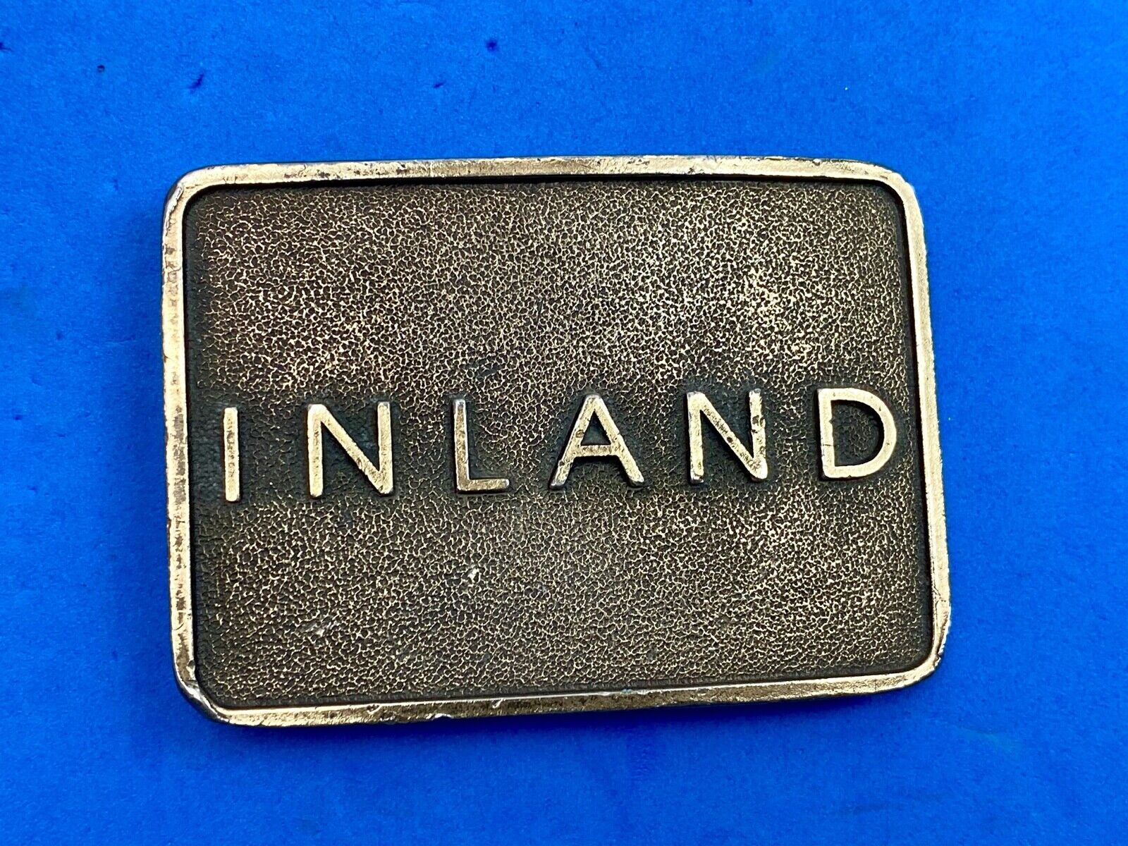 Vintage Inland company belt buckle - truck parts company 
