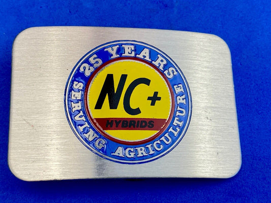 25 years serving agriculture - NC+ Hybrids belt buckle