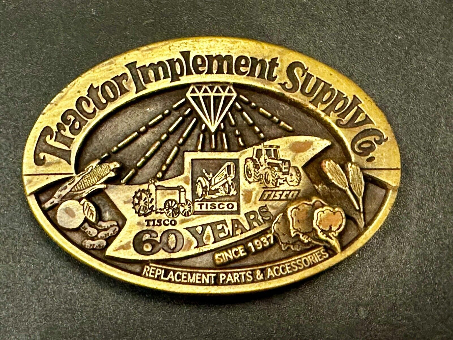 60 Years TISCO Tractor Implement Supply company NOS Belt Buckle by Speccast