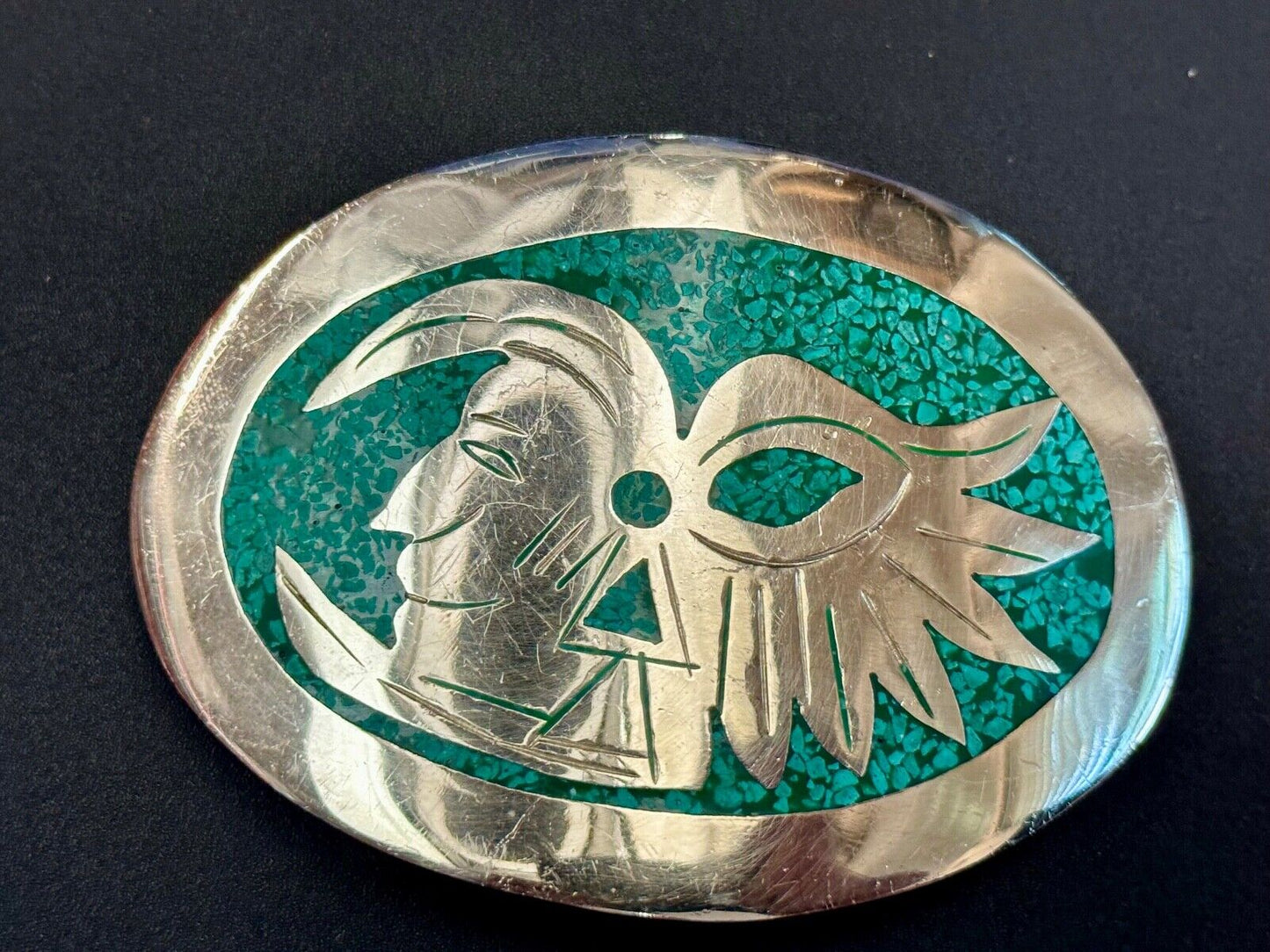 Tribal Face - Inlaid Turquoise chip to Alpaca stamped oval Belt Buckle