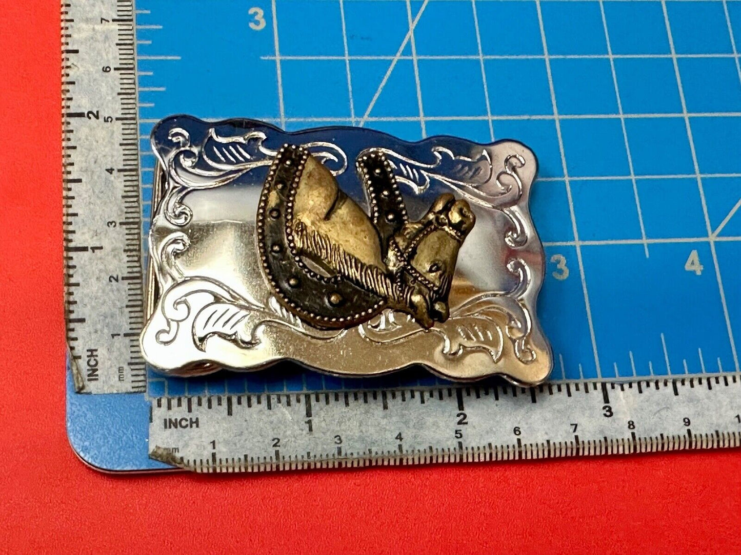 Vintage lucky horseshoe with head centerpiece on western two tone belt buckle