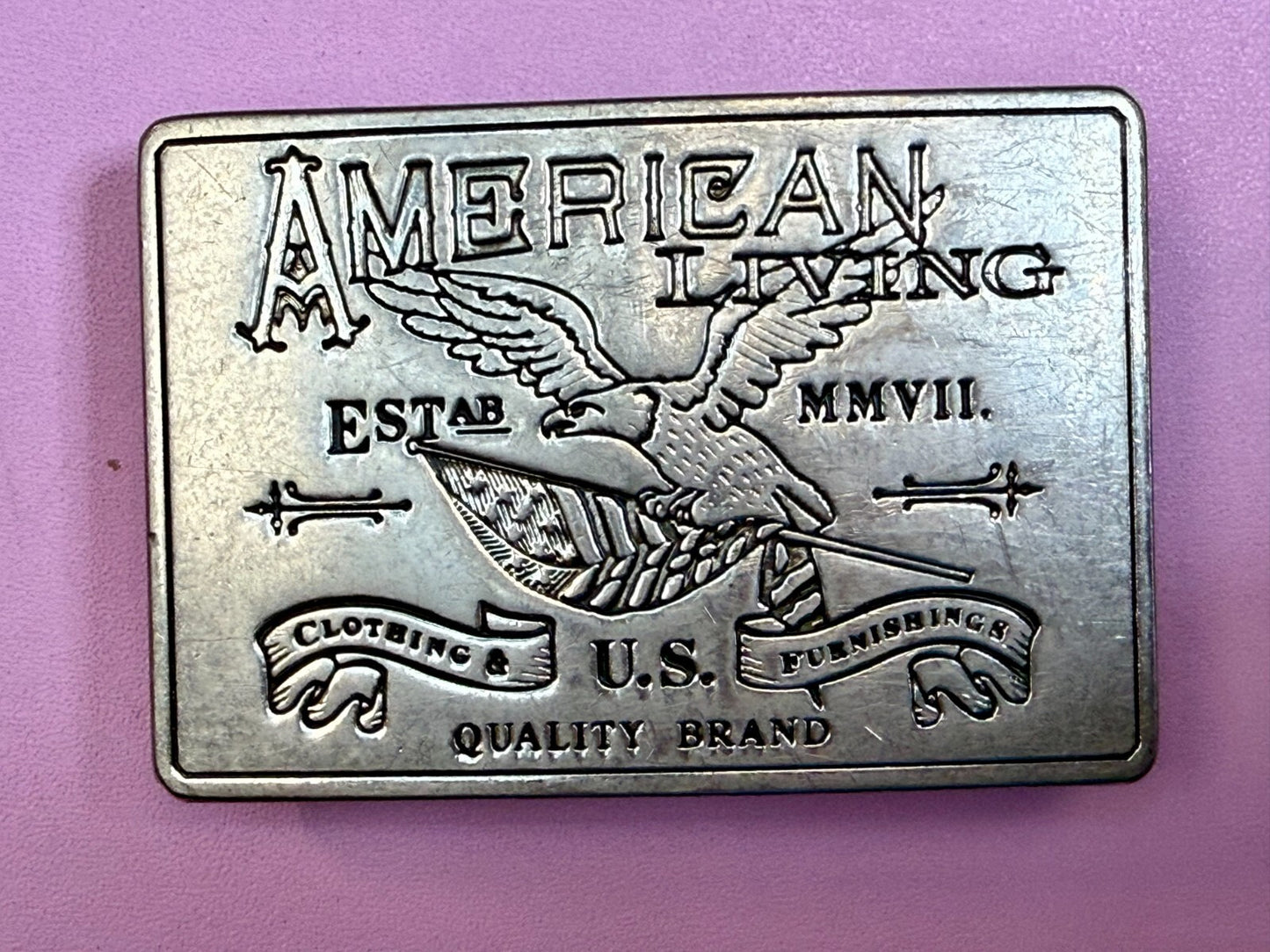 American Living Clothing & Furnishing U.S Quality Brand Promo Belt Buckle