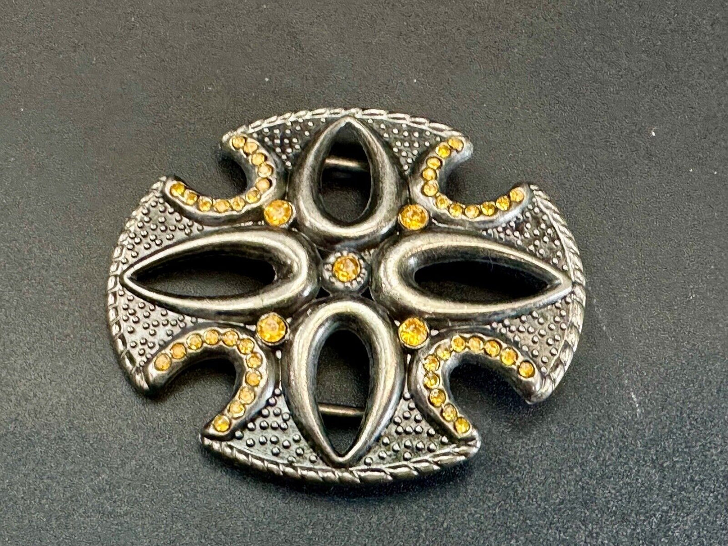 unique see through iron cross with golden brown rhinestone accents