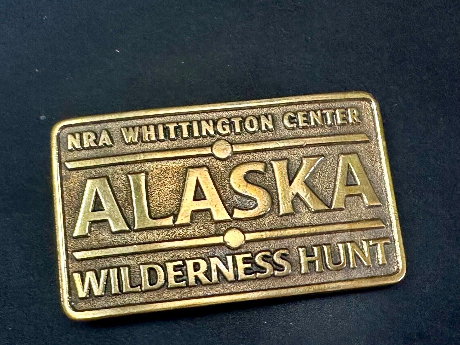 Alaska Wilderness Hunt - vintage belt buckle by NRA Whittington Center