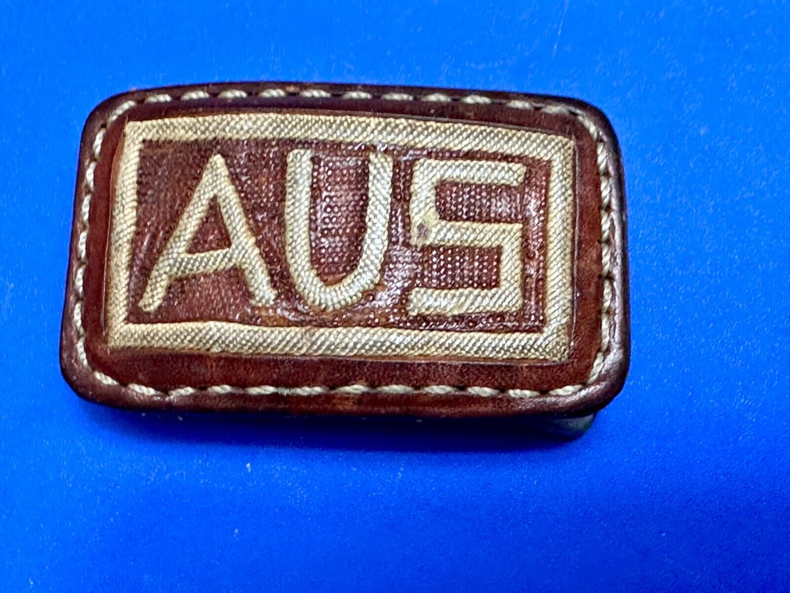 AUS  Brown leather with cream color Stitching  pre loved belt buckle
